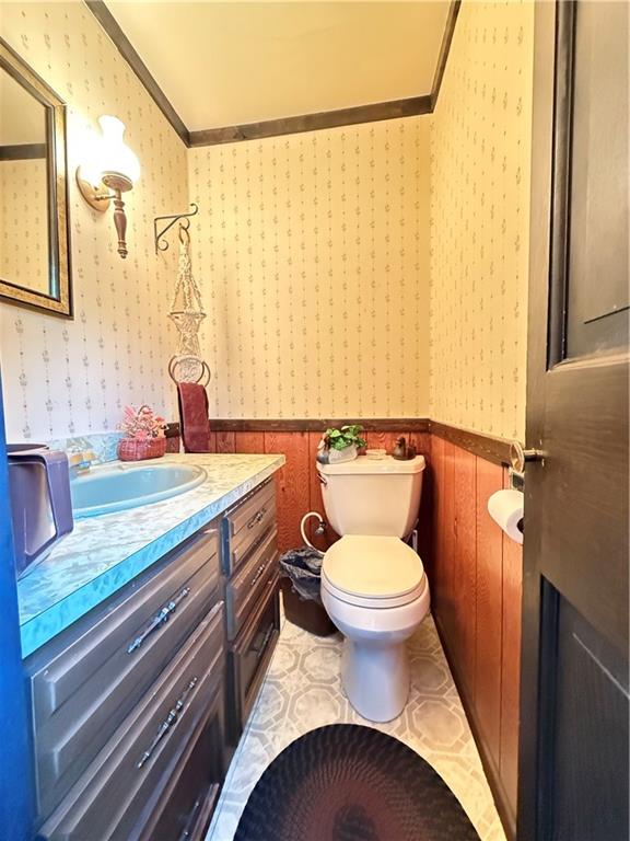 325 Williamson Road Greenville, PA 16125 - Photo 15 of 50 a bathroom with a granite countertop toilet sink and mirror