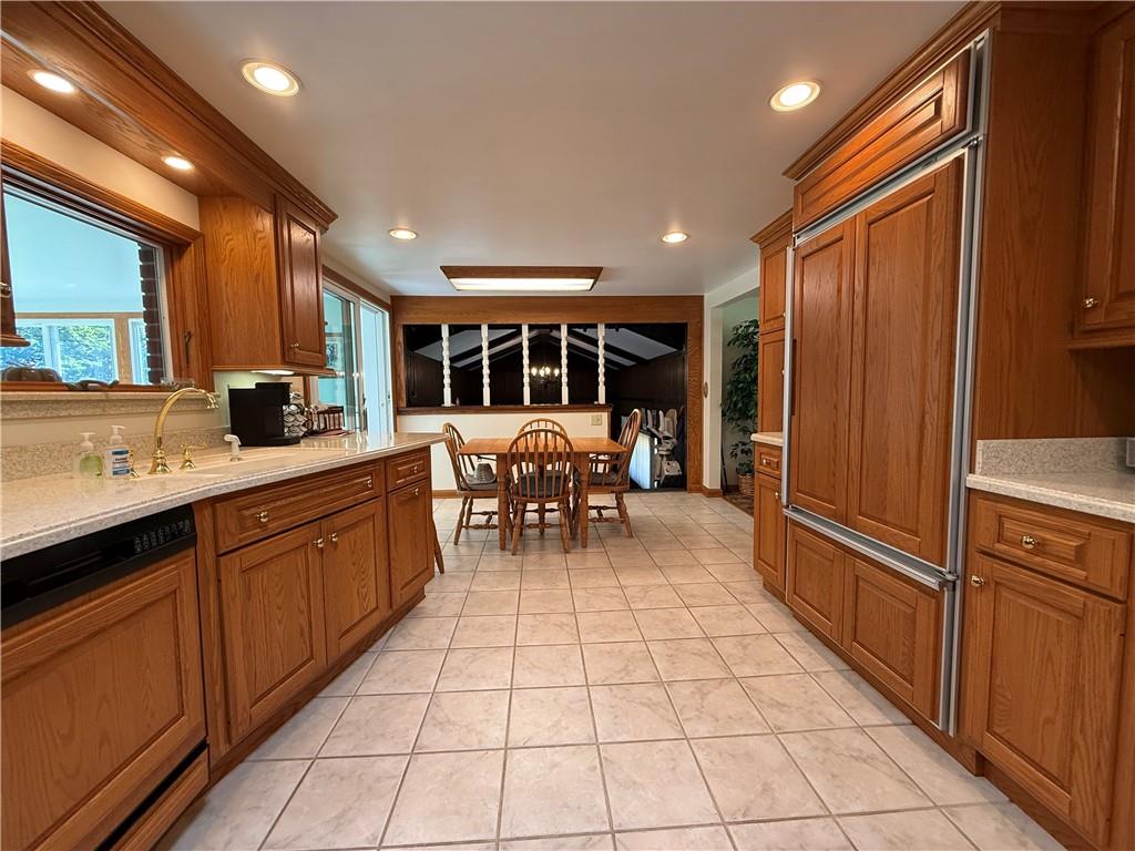 325 Williamson Road Greenville, PA 16125 - Photo 18 of 50 a kitchen with stainless steel appliances granite countertop a refrigerator and a sink