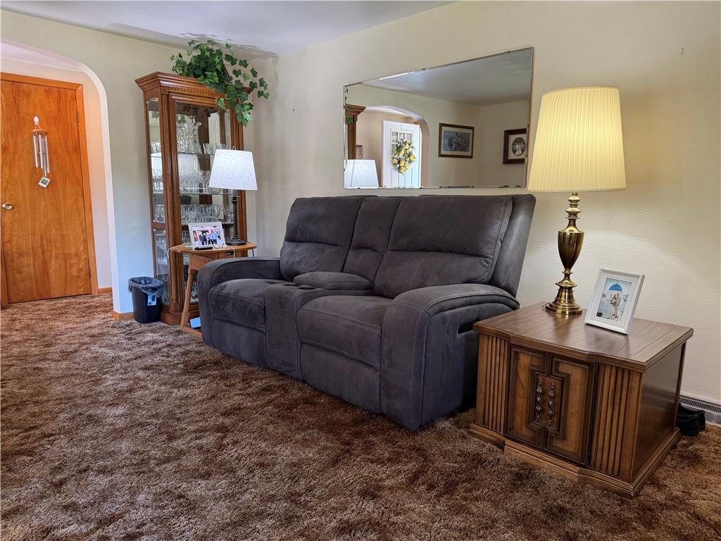 325 Williamson Road Greenville, PA 16125 - Photo 29 of 50 a living room with furniture and a lamp