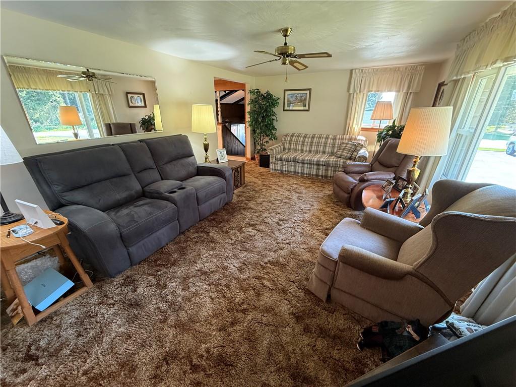 325 Williamson Road Greenville, PA 16125 - Photo 30 of 50 a living room with furniture and a flat screen tv