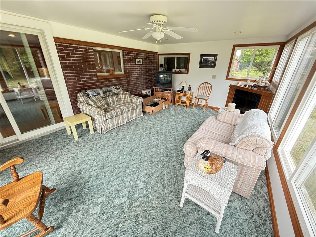 325 Williamson Road Greenville, PA 16125 - Photo 32 of 50 a living room with furniture and a flat screen tv