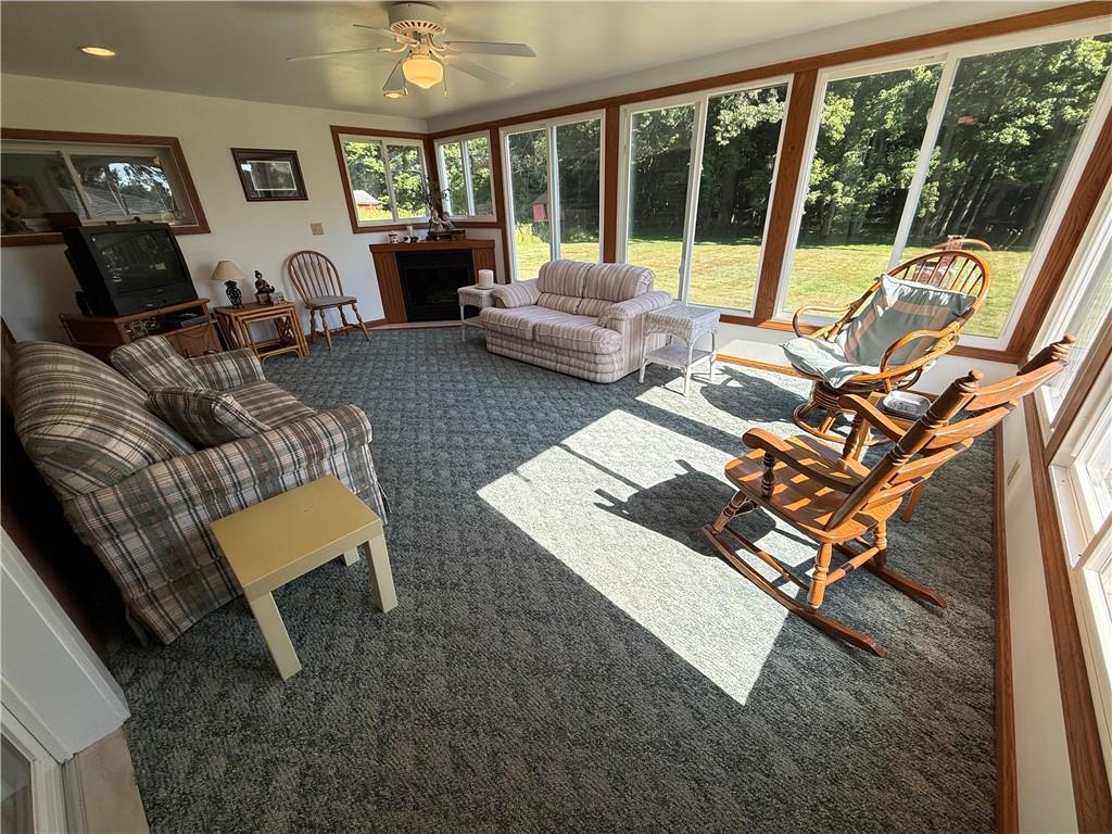 325 Williamson Road Greenville, PA 16125 - Photo 33 of 50 a living room with furniture and a floor to ceiling window