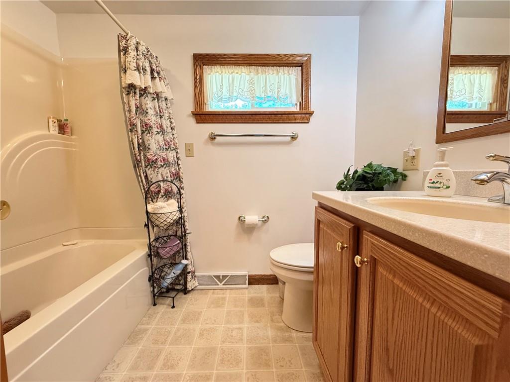 325 Williamson Road Greenville, PA 16125 - Photo 40 of 50 a bathroom with a sink a toilet and a bathtub