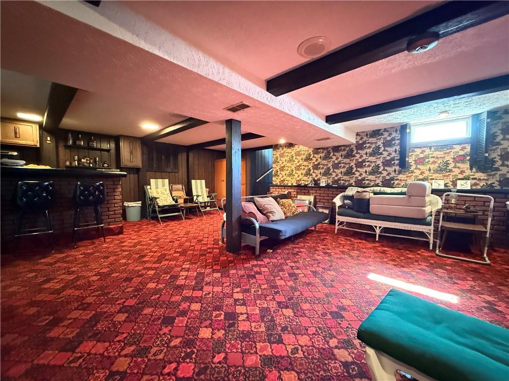 325 Williamson Road Greenville, PA 16125 - Photo 44 of 50 a backyard of a house with barbeque oven table and chairs