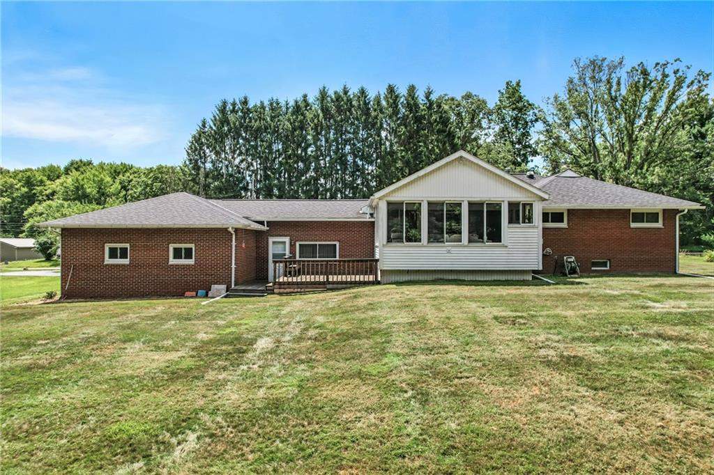 325 Williamson Road Greenville, PA 16125 - Photo 6 of 50 a front view of a house with a garden