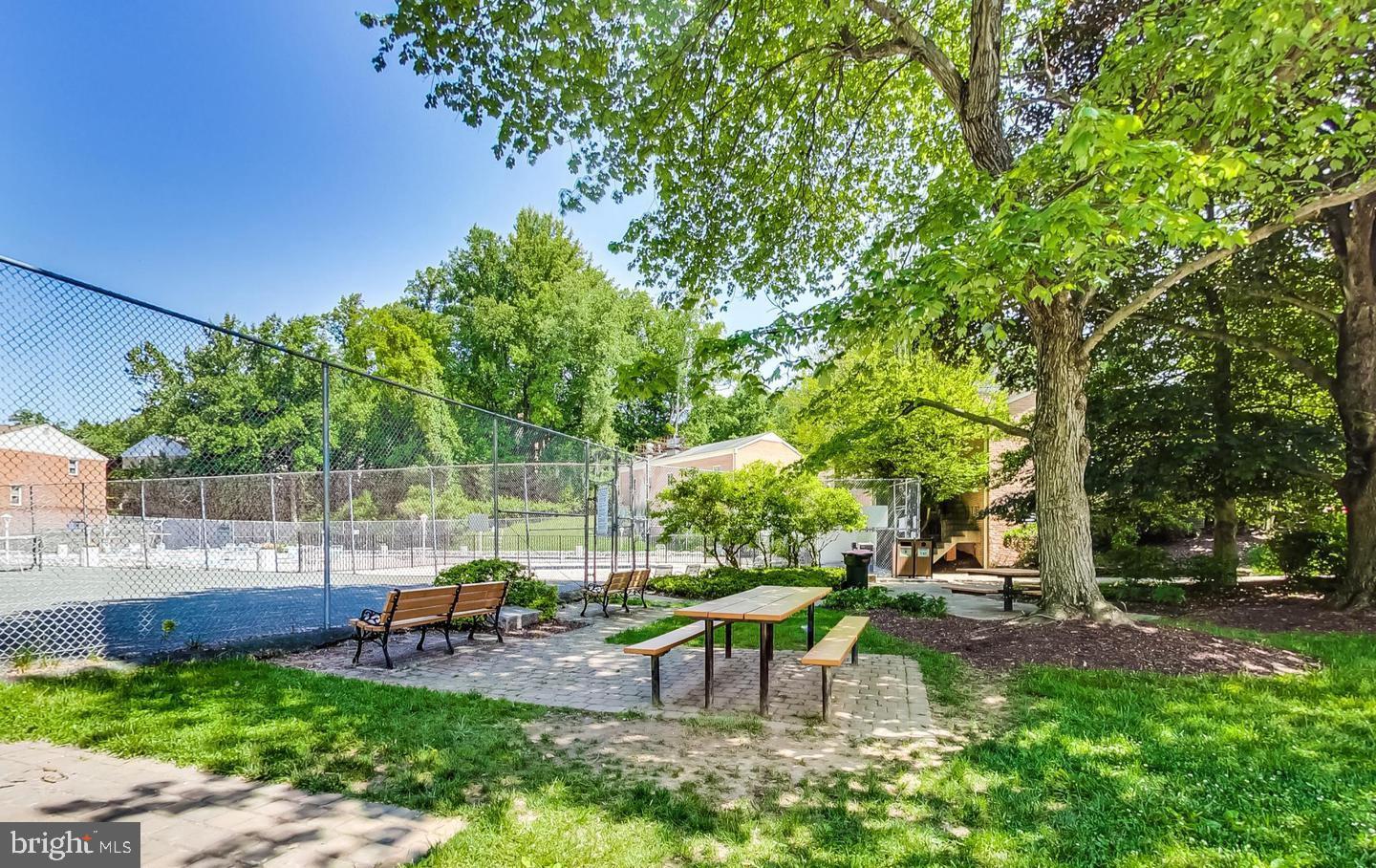 10301 Montrose Avenue, Unit 101 Bethesda, MD 20814 - Photo 21 of 27 a view of a park with slide