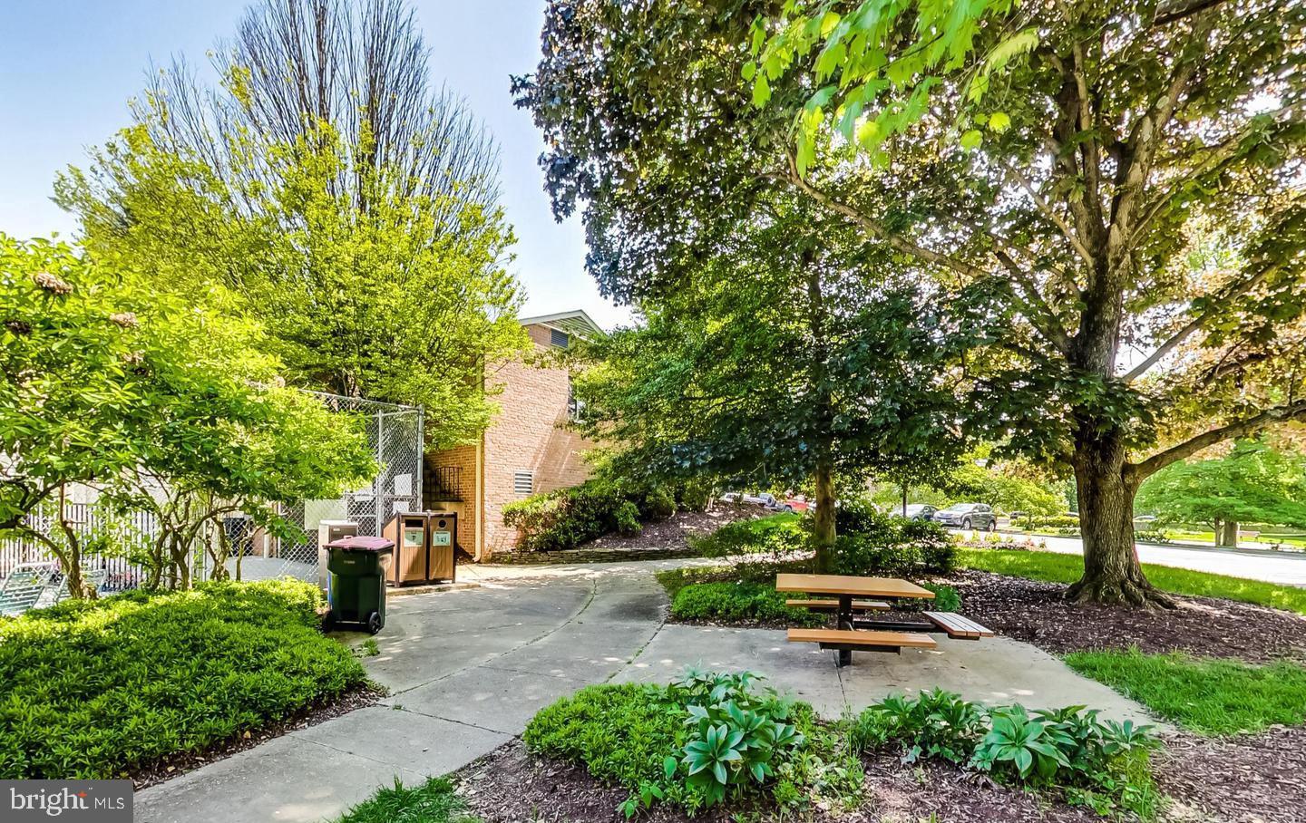 10301 Montrose Avenue, Unit 101 Bethesda, MD 20814 - Photo 22 of 27 a view of outdoor space with garden