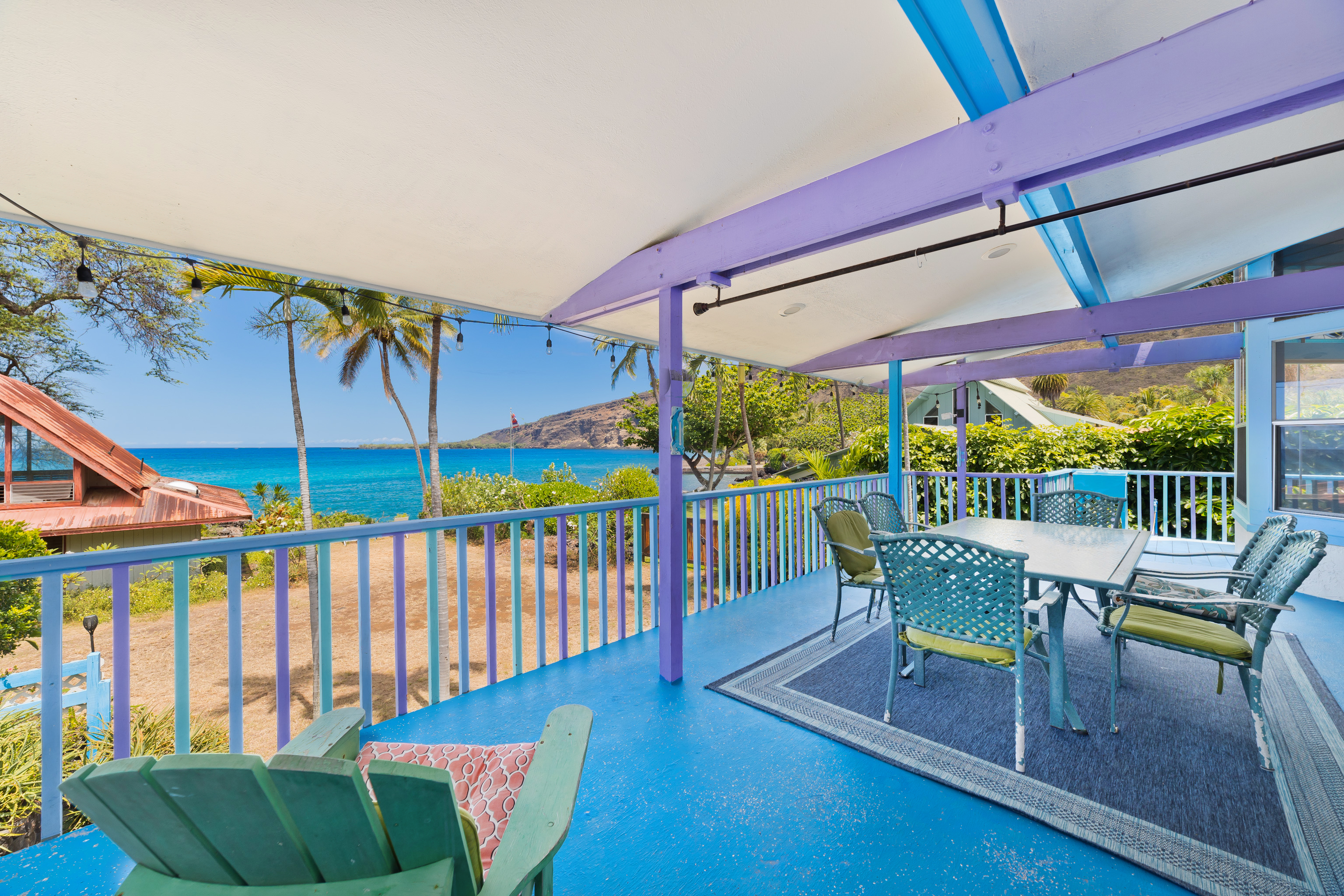82-6301 Puuhonua Road Captain Cook, HI 96704 - Photo 1 of 27 a view of a chairs and table in the patio