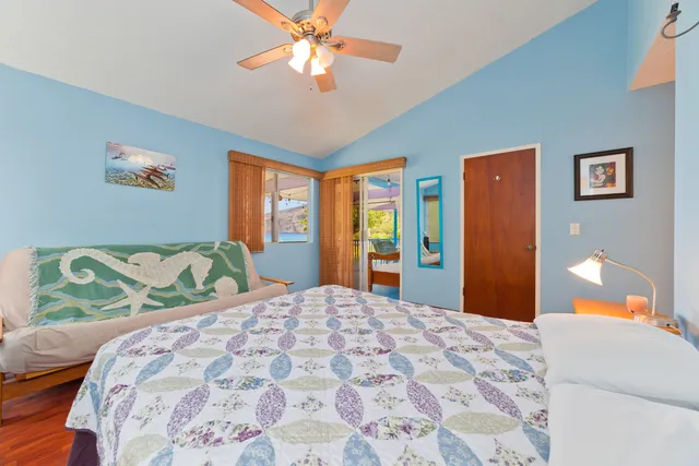 a bathroom with a sink mirror and a bathtub