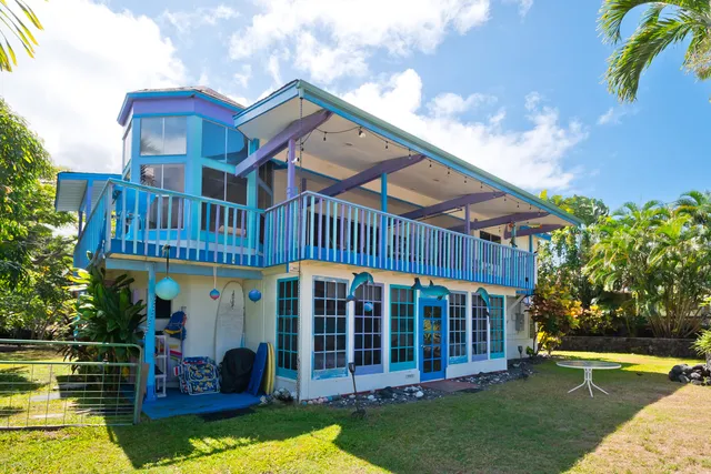 a view of a backyard of a house