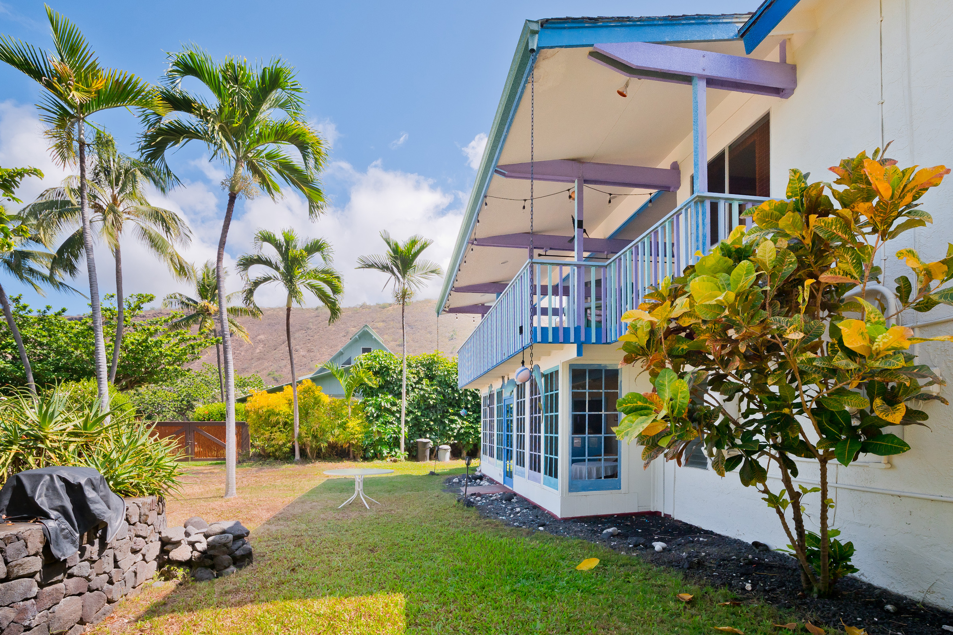 82-6301 Puuhonua Road Captain Cook, HI 96704 - Photo 25 of 27 a view of a house with a flower garden