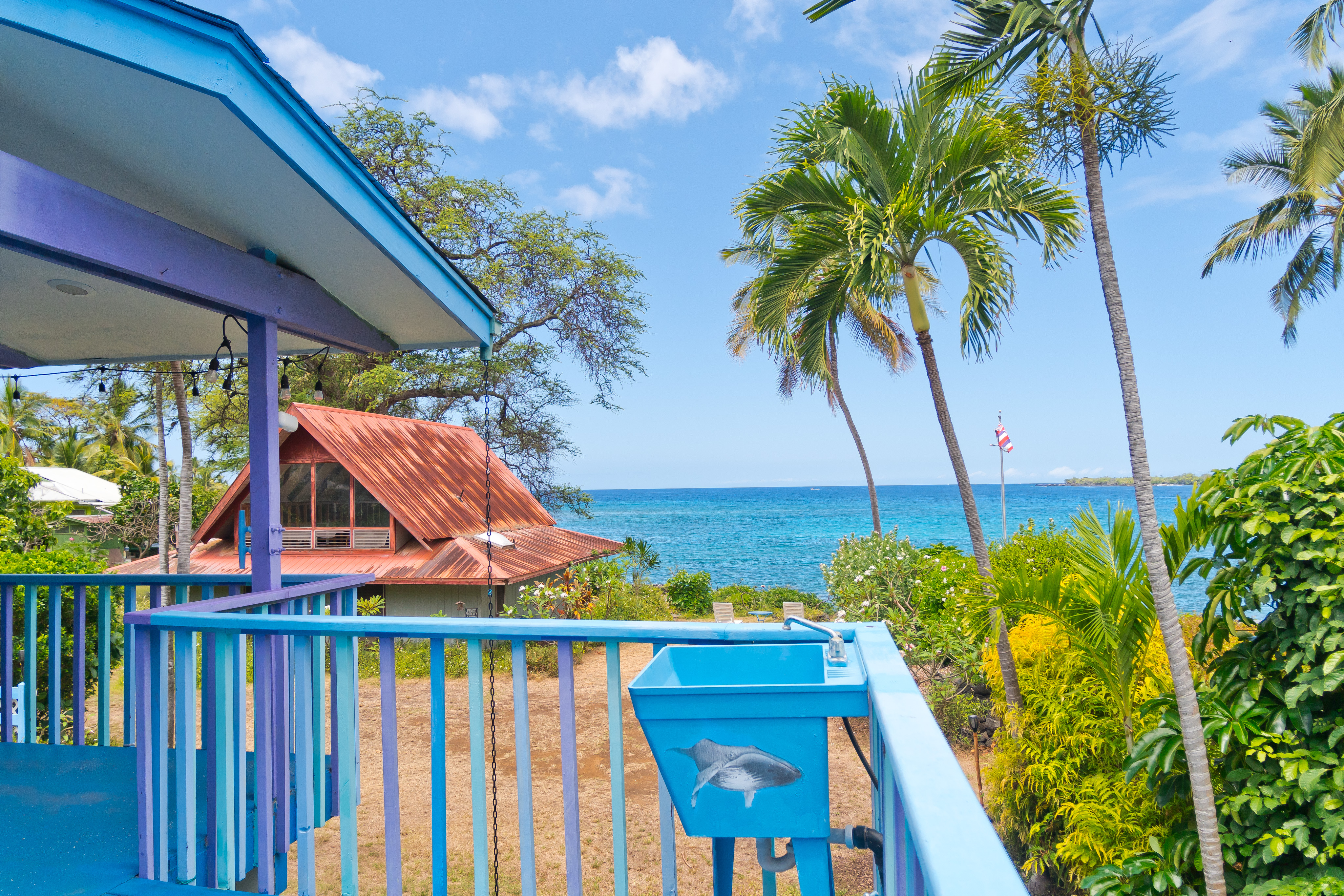 82-6301 Puuhonua Road Captain Cook, HI 96704 - Photo 4 of 27 a view of yard from deck with patio