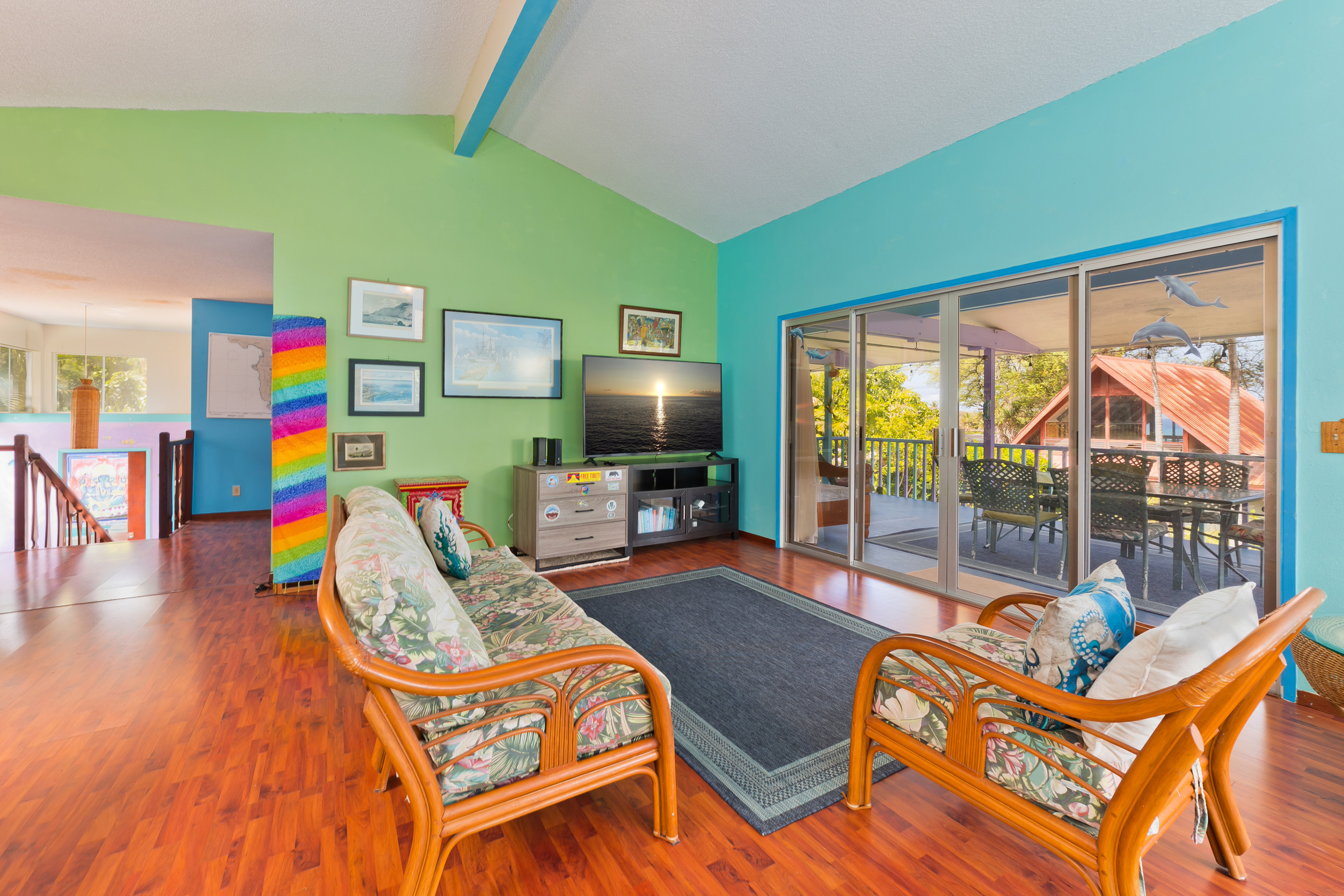 82-6301 Puuhonua Road Captain Cook, HI 96704 - Photo 9 of 27 a living room with furniture and a flat screen tv