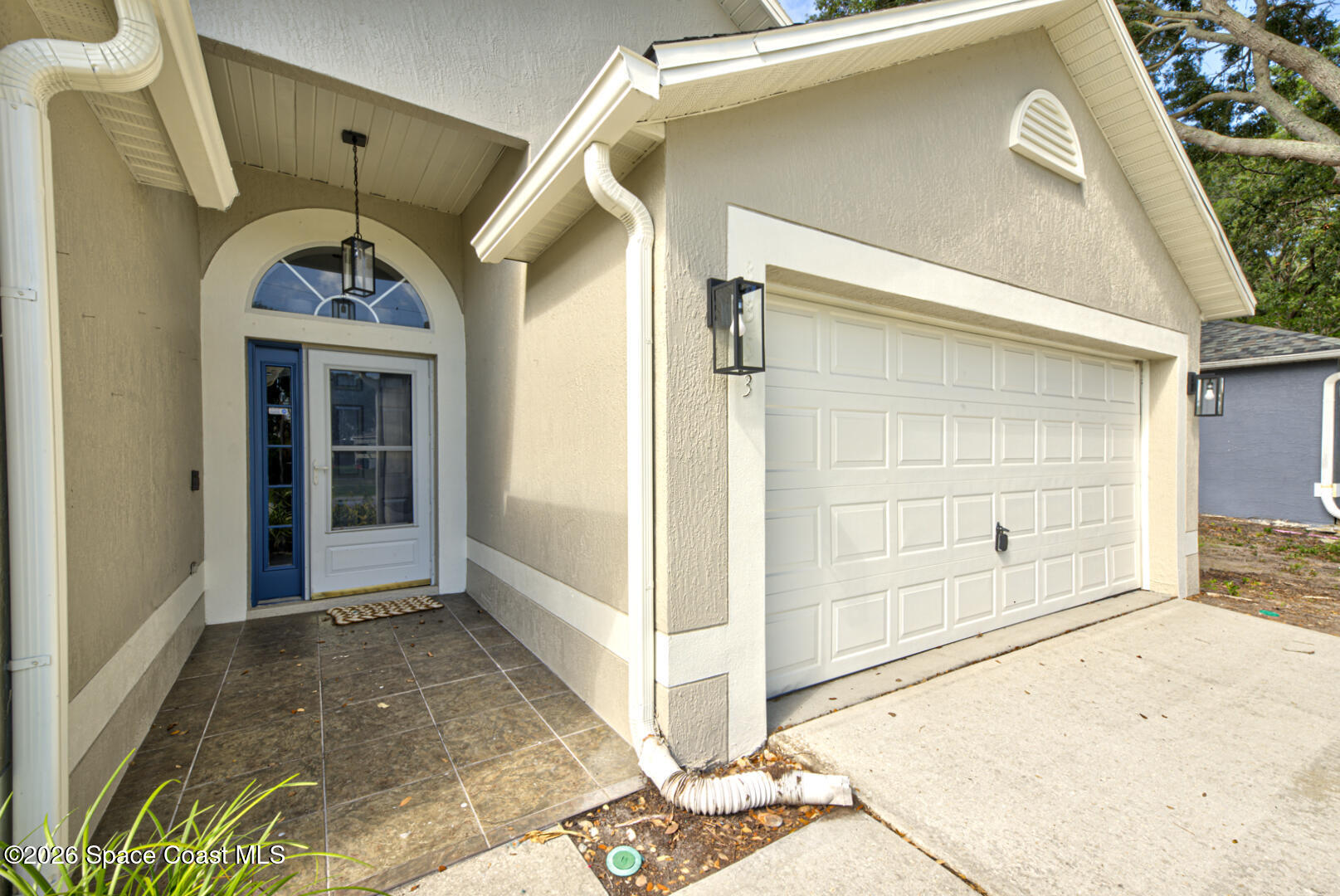 3353 Echo Ridge Place Cocoa, FL 32926 - Photo 2 of 51 front door & garage