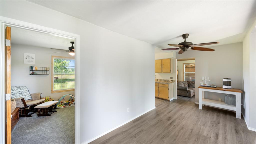 29080 Highway 19 Athens, TX 75752 - Photo 13 of 30 a living room with furniture and a chandelier