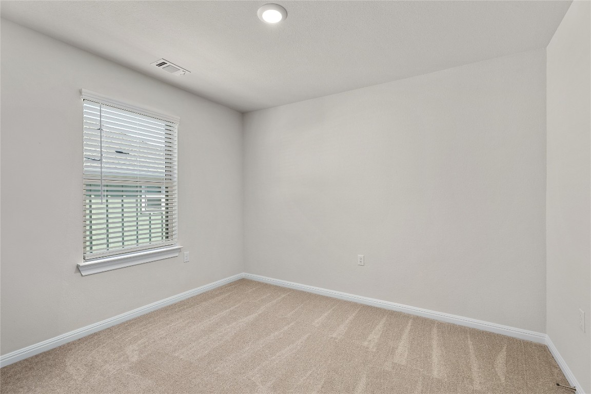 5513 Durango Pass Austin, TX 78724 - Photo 24 of 31 an empty room with a window