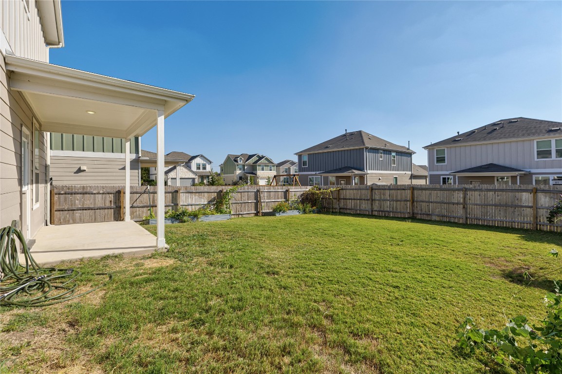 5513 Durango Pass Austin, TX 78724 - Photo 27 of 31 a front view of a house with a yard