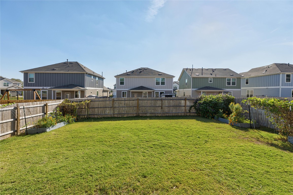 5513 Durango Pass Austin, TX 78724 - Photo 28 of 31 a front view of a house with a yard