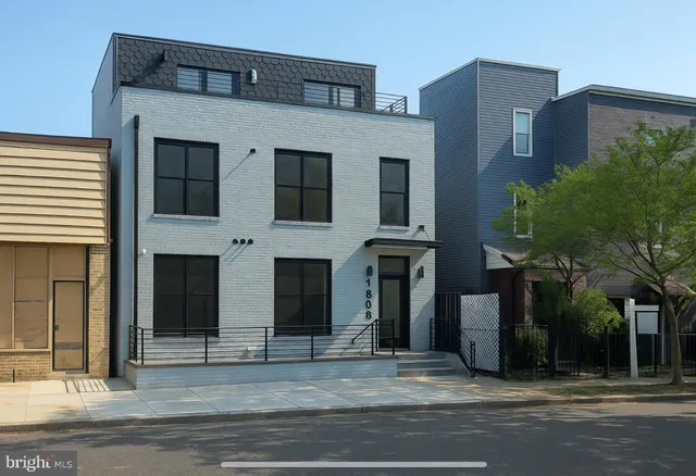 a front view of a house with a garage