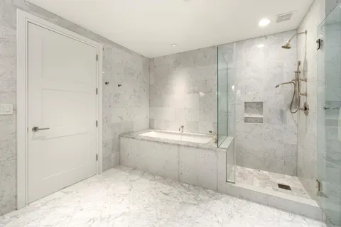 a bathroom with a sink and a shower