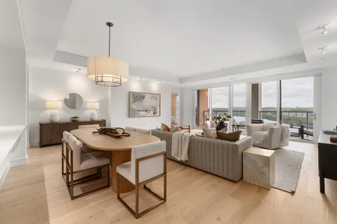 a view of a livingroom with furniture and window