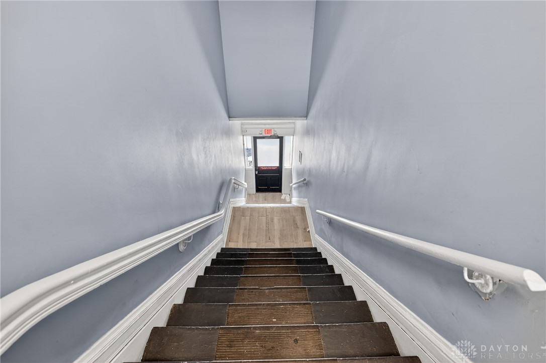 7045-7049 Montgomery Road Cincinnati, OH 45236 - Photo 22 of 68 Navigate home with ease on these charming stairways, connecting levels with timeless appeal.