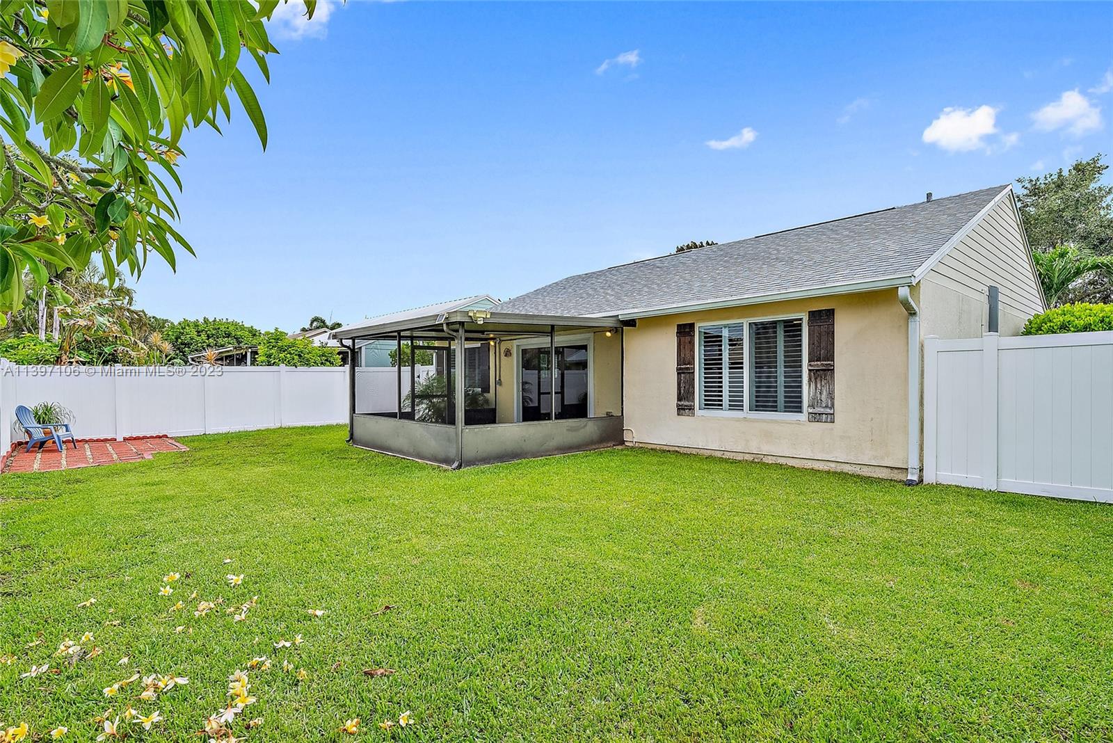 169 Greentree Circle Jupiter, FL 33458 - Photo 17 of 38 a view of a house with a garden