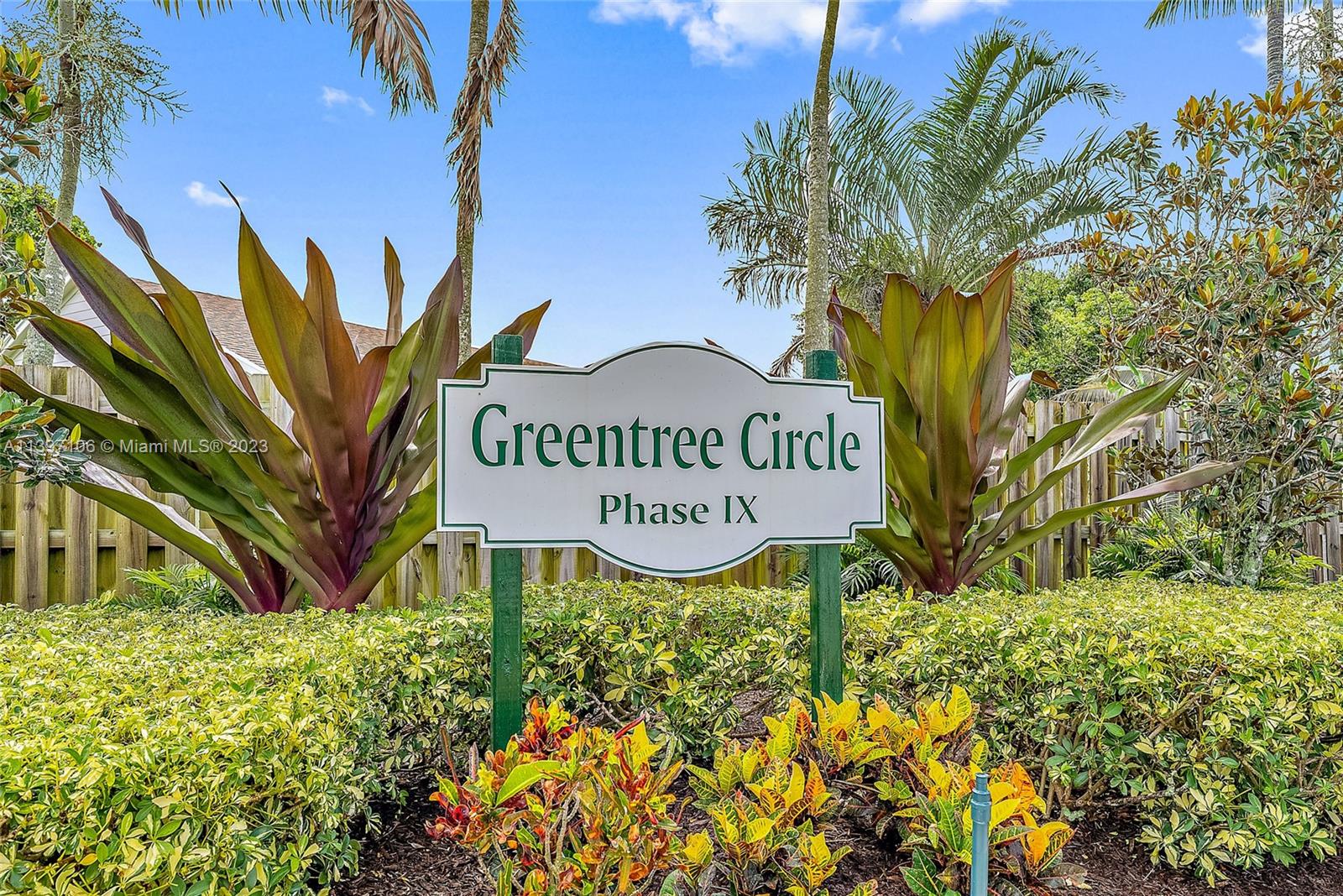 169 Greentree Circle Jupiter, FL 33458 - Photo 28 of 38 a sign on the side of a road