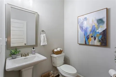 a spacious bedroom with a bed and a dresser