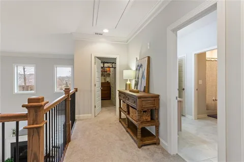 a bedroom with a bed and a chair