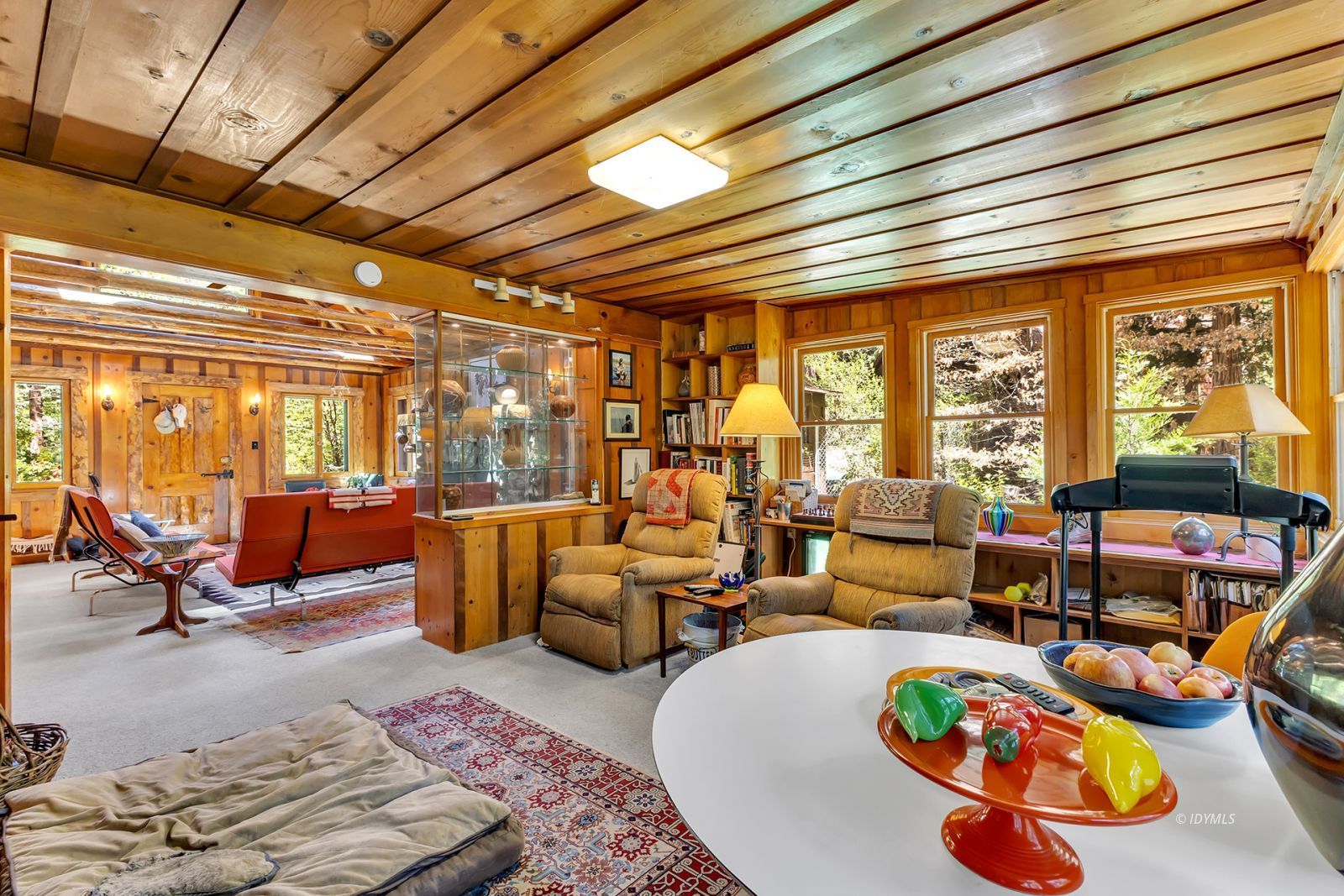 25100 Indian Rock Road Idyllwild, CA 92549 - Photo 20 of 75 a living room with furniture and floor to ceiling window