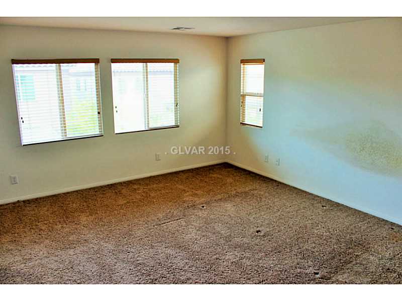 7914 Red Rock Ridge Avenue Las Vegas, NV 89179 - Photo 16 of 35 Property Photo. Upstairs Master Bedroom