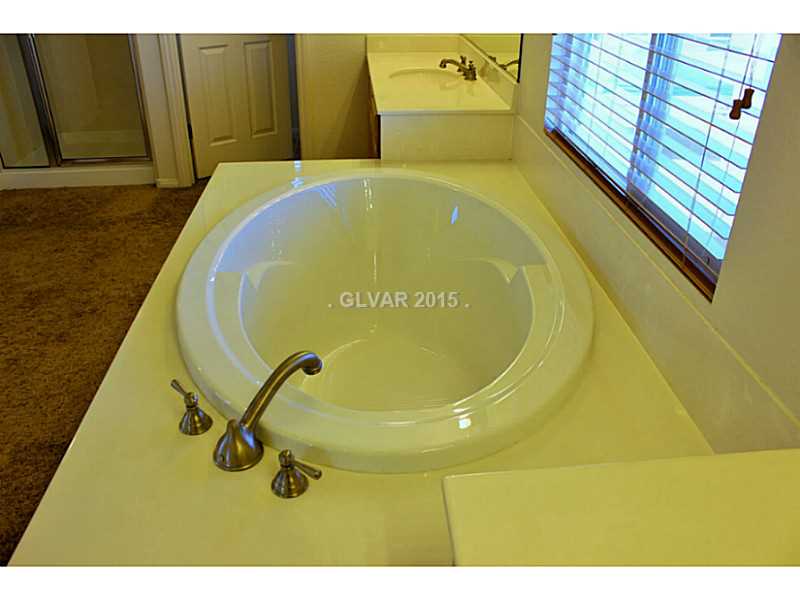 7914 Red Rock Ridge Avenue Las Vegas, NV 89179 - Photo 21 of 35 Property Photo. Master Bathroom Tub with upgraded faucets