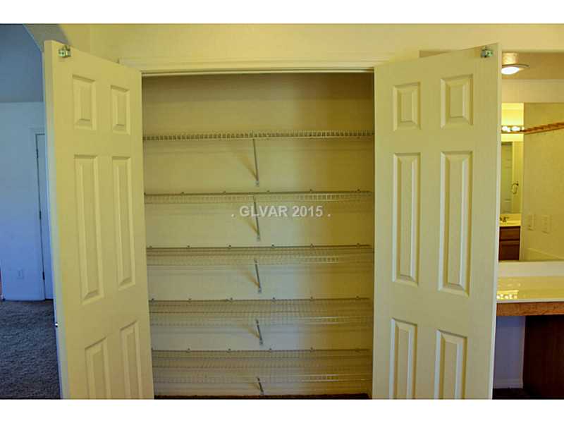 7914 Red Rock Ridge Avenue Las Vegas, NV 89179 - Photo 23 of 35 Property Photo. Master Bedroom linen closet