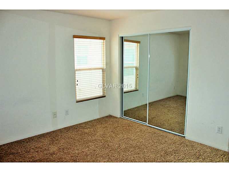 7914 Red Rock Ridge Avenue Las Vegas, NV 89179 - Photo 24 of 35 Property Photo. Upstairs 2nd Bedroom