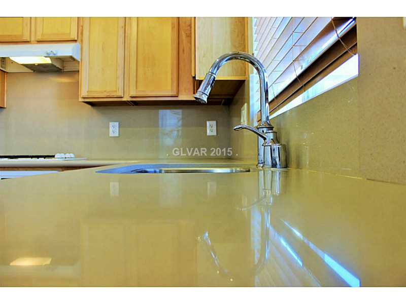 7914 Red Rock Ridge Avenue Las Vegas, NV 89179 - Photo 7 of 35 Property Photo. Upgraded counters, under mount sink, Moen faucet
