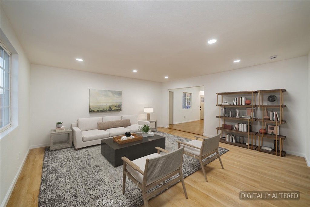 555 North Chestnut Avenue Rialto, CA 92376 - Photo 11 of 33 a living room with furniture and a wooden floor