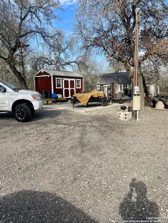 a view of a car parked in front of house