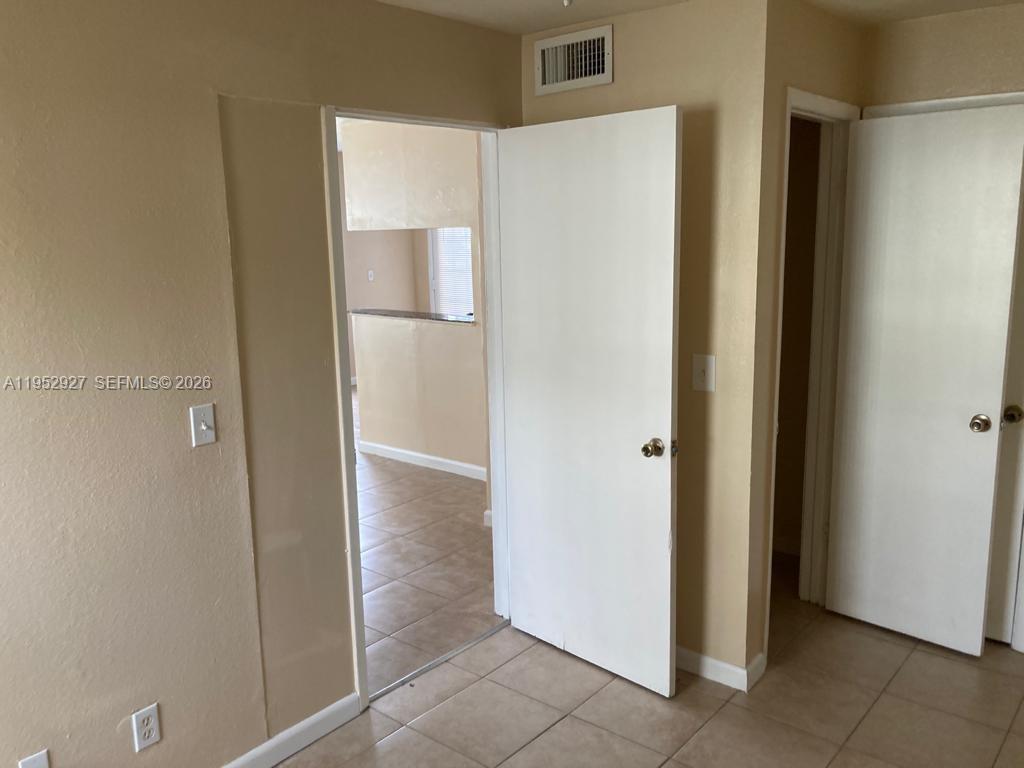 8705 Northwest 39th Street Sunrise, FL 33351 - Photo 8 of 13 a view of an empty room