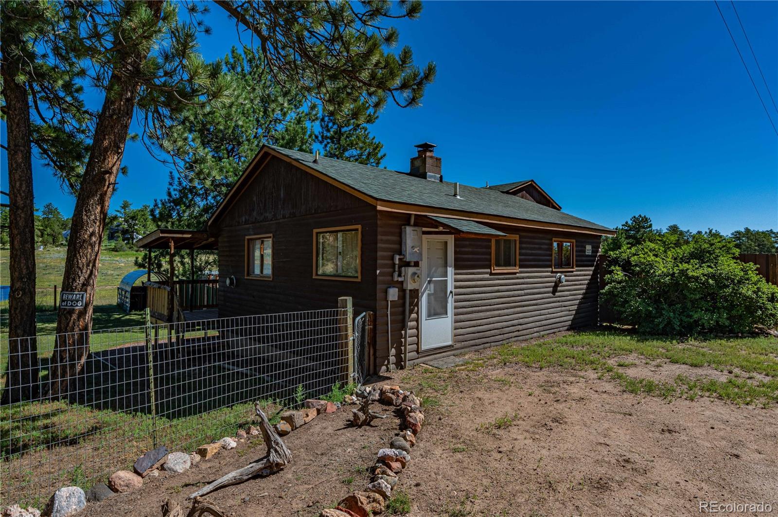 2925 M Path Cotopaxi, CO 81223 - Photo 38 of 50 a front view of a house with a garden