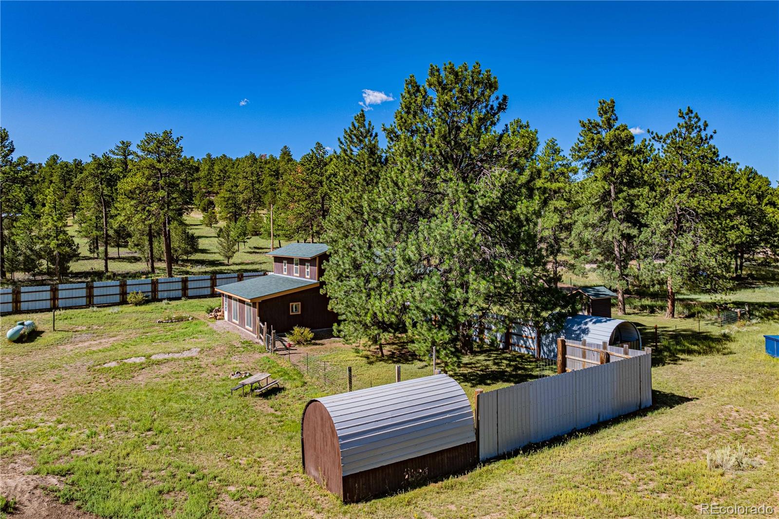 2925 M Path Cotopaxi, CO 81223 - Photo 44 of 50 a view of a swimming pool with a patio