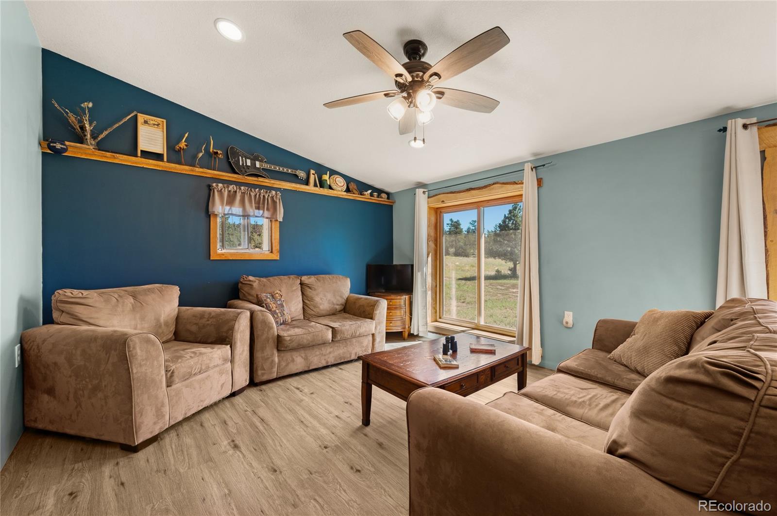 2925 M Path Cotopaxi, CO 81223 - Photo 5 of 50 a living room with furniture and a large window