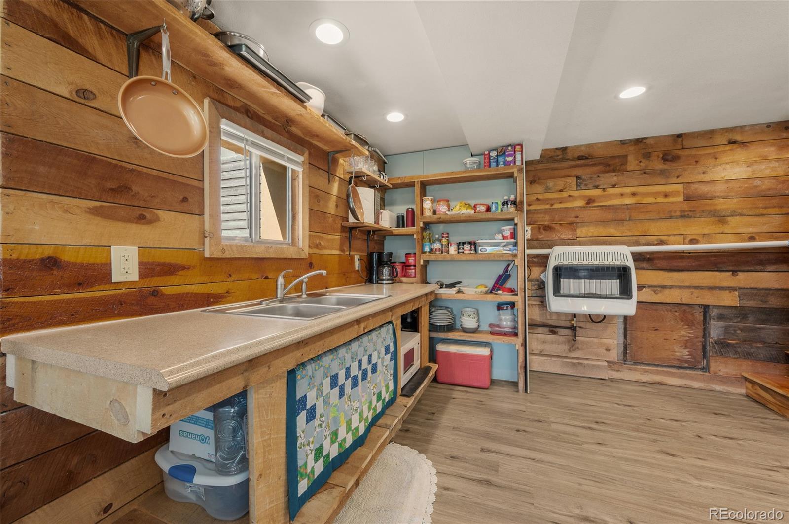 2925 M Path Cotopaxi, CO 81223 - Photo 10 of 50 a kitchen with stainless steel appliances a stove and cabinets