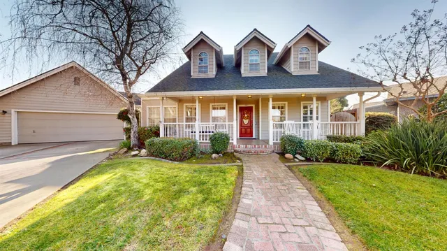 a view of house with garden