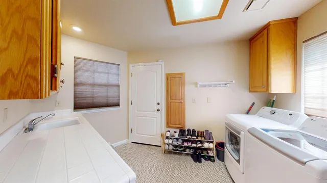 a view of utility room with washer and dryer