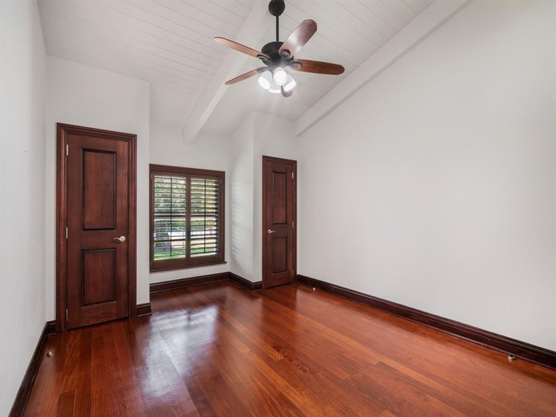 441 Ridge Road Coral Gables, FL 33143 - Photo 18 of 23 wooden floor in an empty room with a window