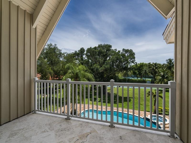 441 Ridge Road Coral Gables, FL 33143 - Photo 7 of 23 a balcony with trees in front of it
