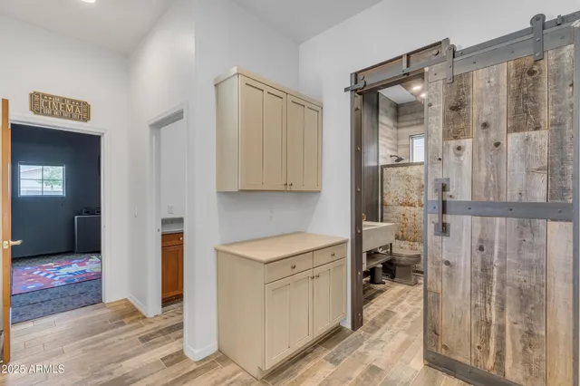 a bath tub sitting in a bathroom next to a window