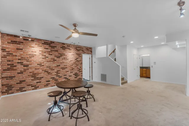 a view of a yard with plants and a outdoor view