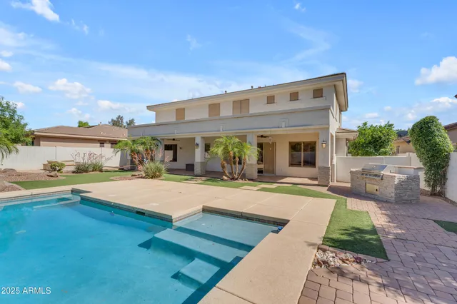a view of entryway with stairs and wooden floor
